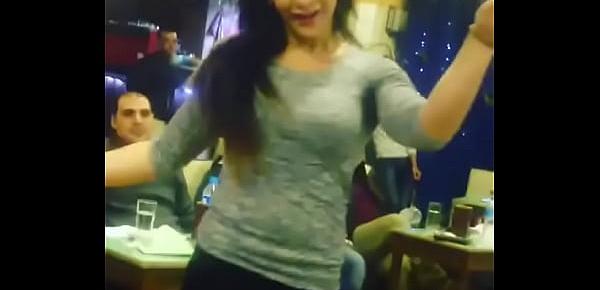  arab girl dancing with friends in Cafe